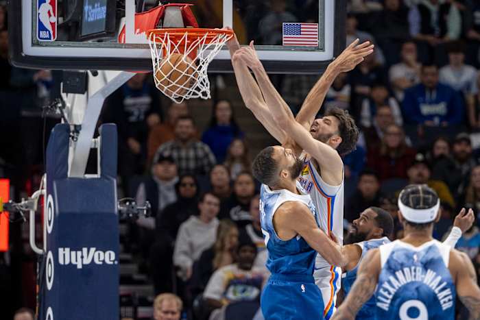 Nov 28, 2023; Minneapolis, Minnesota, USA; Oklahoma City Thunder forward Chet Holmgren (7) dunks over Minnesota Timberwolves center Rudy Gobert (27) in the second half at Target Center. Mandatory Credit: Jesse Johnson-USA TODAY Sports